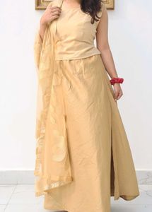 Elegant Gold coloured crop top with skirt