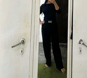 Stylish Wide-Legged Pants with Gold Chain Detail