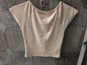 beige crop top