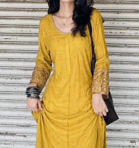 Yellow Kurta with White Pants