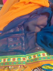 Vibrant Orange Embroidered Saree