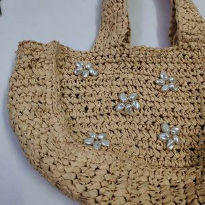 Straw tote bag with pearl embellishments