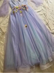 Elegant Lavender Gown with Floral Embellishments