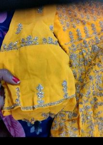 New yellow shuit(never used)