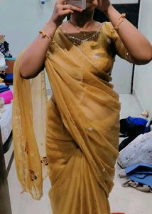 Elegant Golden Saree with Floral Embroidery