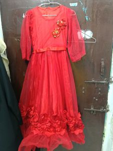 Stunning Red Net Gown with Floral Embellishments