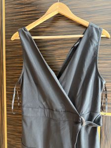 Sleek Black Wrap Playsuit new w/o tags
