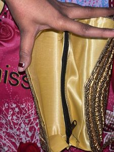 Elegant Gold Embellished Clutch