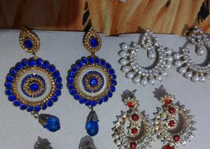 4 Earrings, And 2 Necklace