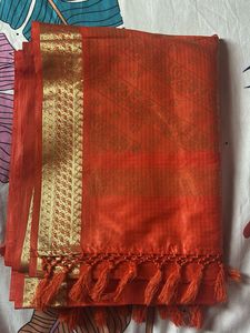 Orange Silk Saree with Gold Border