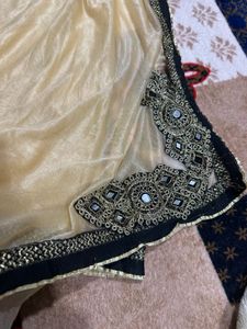 Cream Shimmer Saree with Golden n black Border
