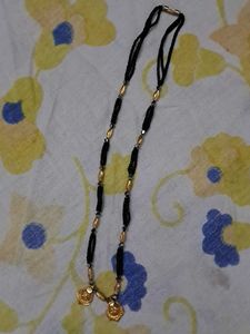 Elegant Beaded Necklace with Gold Pendant