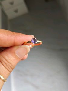 Elegant Gold Ring with Purple Stone