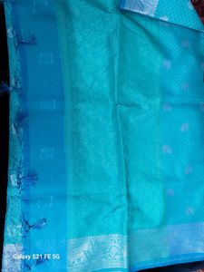 Elegant Teal Saree with Silver Weave