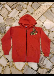 23. Red Zip-Up Hoodie with Paisley Design