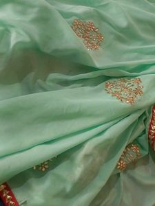 Elegant Mint Green Saree with Gold Embroidery