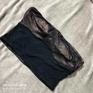 372510. Sheer Mesh Strapless Tube Top