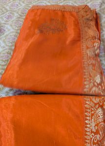Stunning Orange Saree with Gold Border