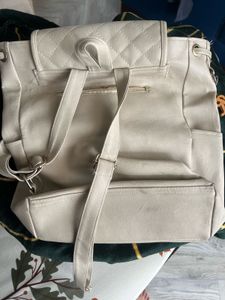 Cream Quilted Backpack including free delivery