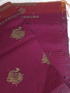 Elegant Maroon Striped Saree with Peacock Motifs