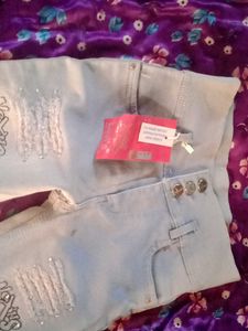 Stylish Ripped Jeans with Embellishments