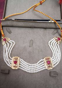 Exquisite Pearl Necklace with Ruby Accents