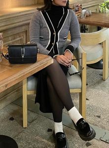 Chic grey cardigan with contrast trim 🤍