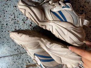 White and Blue Sneakers