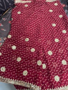 Elegant Maroon Saree with Gold Embroidery