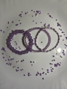 purple bracelet stack