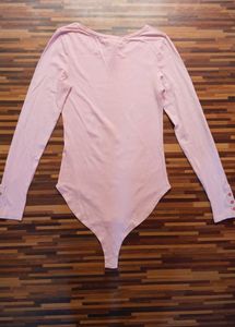 Peach Full-Sleeve Bodysuit by Amisu