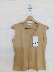 Sleeveless Button-Down Top