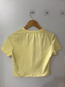 Yellow Cropped T-Shirt with Pink Flower