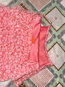 Pink sleeveless strip floral top