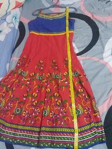 Red Coloured Sleeveless Anarkali Kurta With Koti.