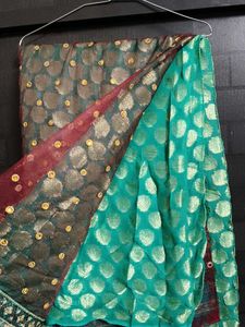 Elegant Teal Saree with Embellishments