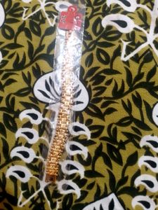 New Golden colour bracelet for women(NEVER USED)