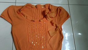 Orange Ribbed Knit Top with Bow Detail
