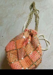 Elegant Red Potli pouch with Pearls