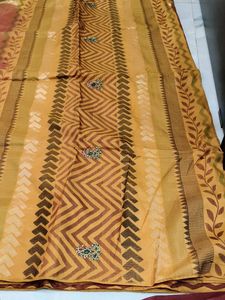 Elegant Yellow Saree with Intricate Design