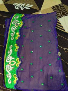 Embroidered yellow and violet Saree with Green Bor