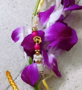 7 Assorted Rakhi Bracelets with Ornate Designs