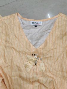 Elegant Yellow Striped Kurta with Tassel Detail