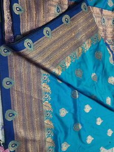 Beautiful Teal Silk Saree with Gold Weave and comp
