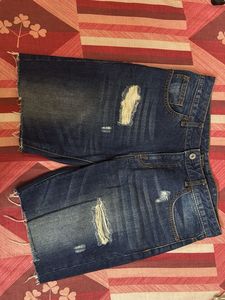 Distressed Denim Jeans