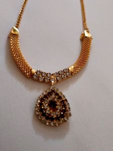 It is a small pretty Elegant Necklace