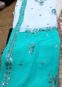 Stunning White & Teal Sequined Saree