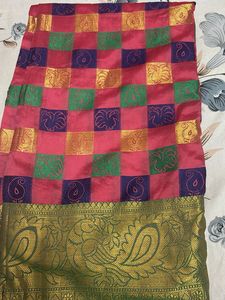 Vibrant Pink Silk Saree with Peacock Border