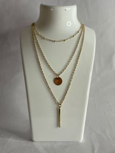 Layered Gold Tone Disc Necklace