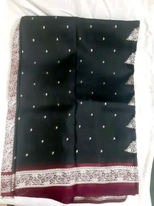 Elegant Black Saree with Intricate Borders